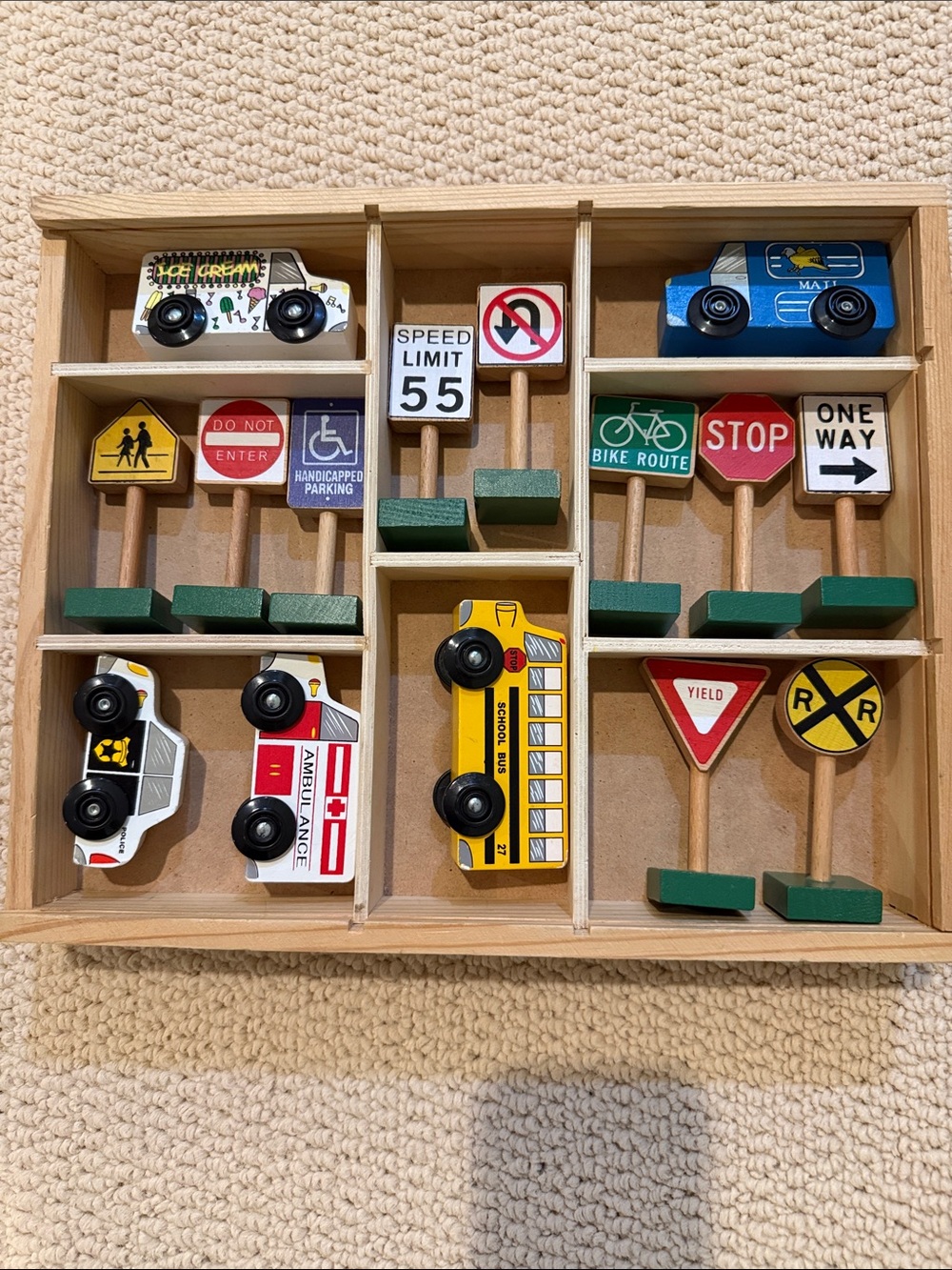 Melissa and Doug wooden vehicle and traffic sign set